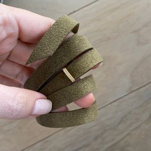 La Soula 14kt diamond wrap bracelet on olive green suede